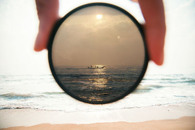 Close-up of sea seen through glass