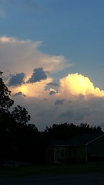 Silhouette of house at sunset