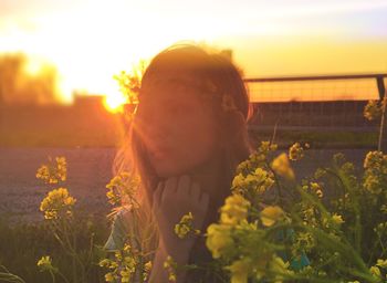 Silhouette of woman at sunset