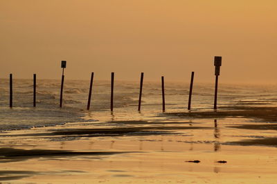 Scenic view of sea at sunset