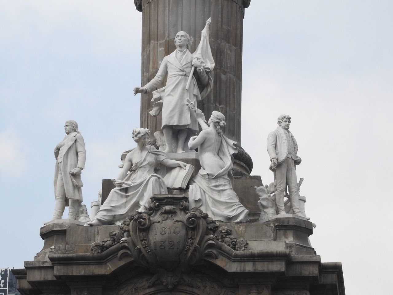 sculpture, statue, art and craft, human representation, representation, male likeness, sky, creativity, architecture, female likeness, low angle view, day, history, no people, the past, nature, memorial, craft, built structure, travel destinations, outdoors, angel, government