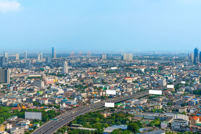 High angle view of buildings against sky in city