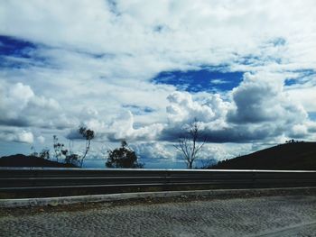 View of landscape against cloudy sky