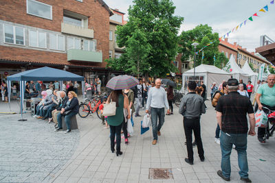 People on street in city