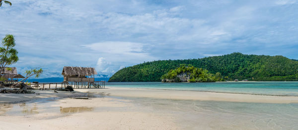 Scenic view of beach against sky