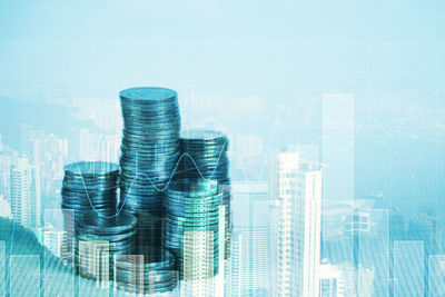 Digital composite image of modern glass building in city