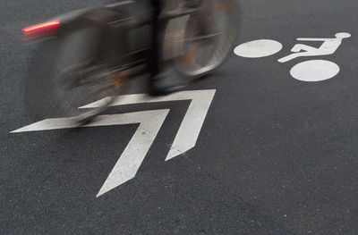 Road sign on street in city