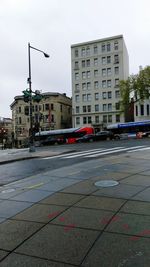 View of city street against sky