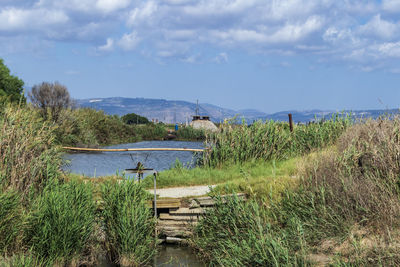 Scenic view of land against sky