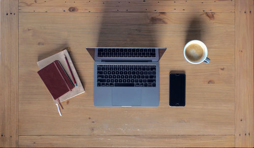 Directly above shot of coffee cup on table