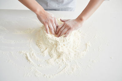 Midsection of woman preparing food