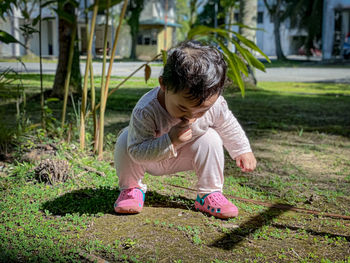 Full length of girl with arms raised