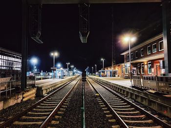 Railroad station platform at night