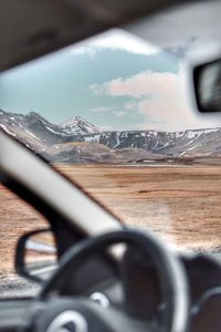 Mountains seen through car