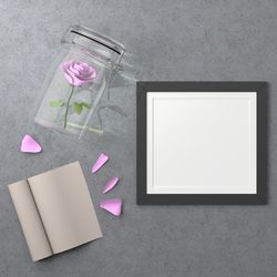 High angle view of pink flower on table