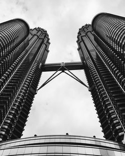 Low angle view of petronas towers against sky