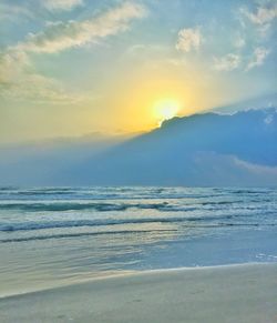 Scenic view of sea at sunset