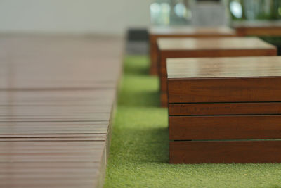 Close-up of empty bench on table