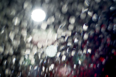 Full frame shot of wet glass in rainy season