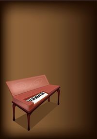 Close-up of piano against gray background