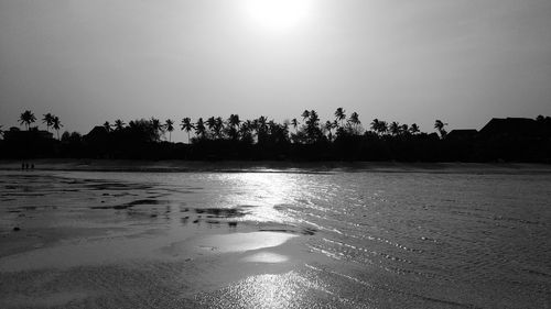 Scenic view of beach against clear sky