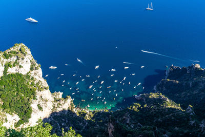 High angle view of mountain by sea