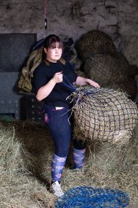 Full length of woman standing on field