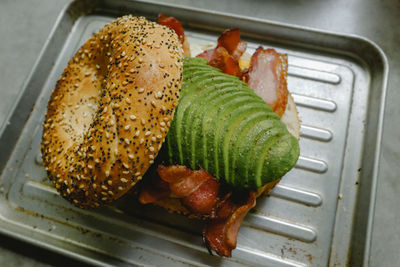 High angle view of meat on barbecue grill