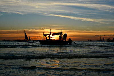 Scenic view of sea at sunset