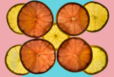 Close-up of oranges against white background