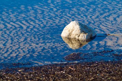 High angle view of stones on beach