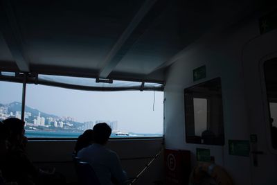 Silhouette of man in window