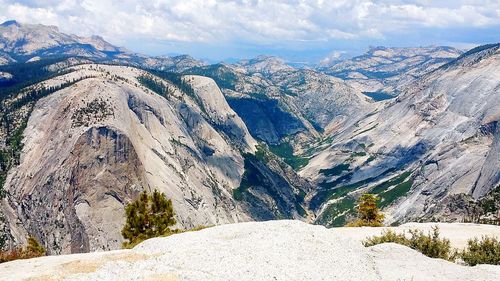 Panoramic view of snowcapped mountains against sky