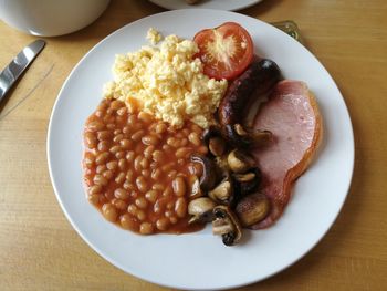 Close-up of breakfast in plate on table