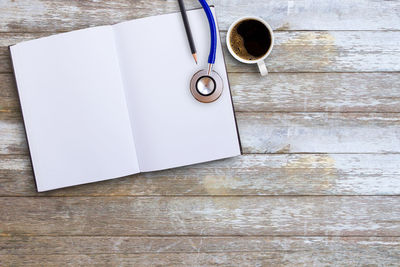 High angle view of coffee cup on table