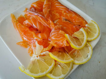 High angle view of orange fruit on table