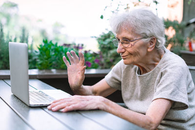 Young man using laptop at home