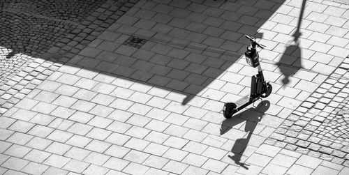 High angle view of people walking on footpath