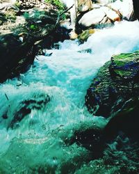 Close-up of rocks in water