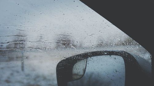 Close-up of wet car window