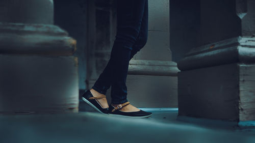 Low section of woman standing on floor
