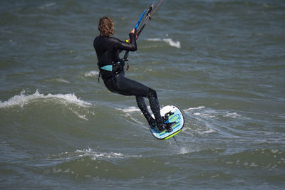 Man surfing in lake