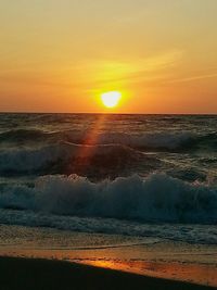 Dramatic sky over sea during sunset