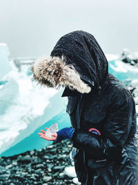 Man with umbrella in snow