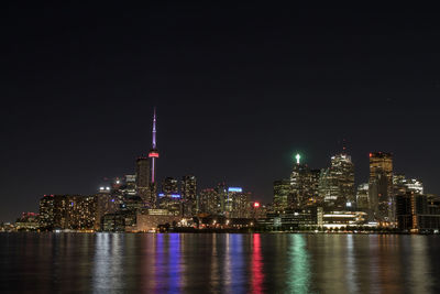 Illuminated buildings in city at night