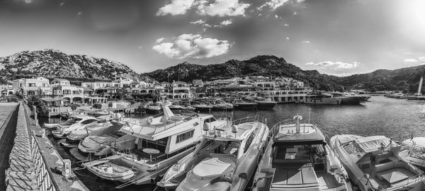 Panoramic view of boats moored in bay