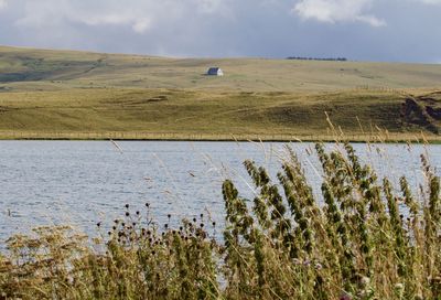 Scenic view of land against sky