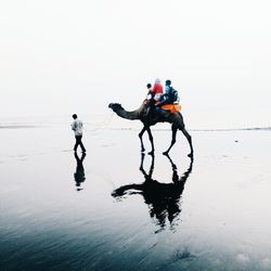 Man kayaking in water