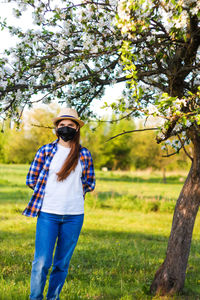 Portrait of young woman wearing black face mask. dust protection against virus. coronavirus pandemic 