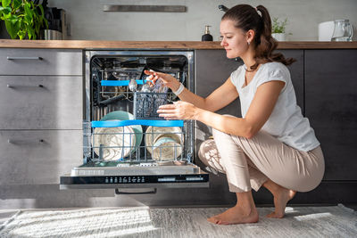 Side view of man working at home